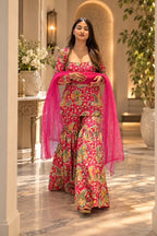 Pink paisley printed flared kurta set with sheer dupatta