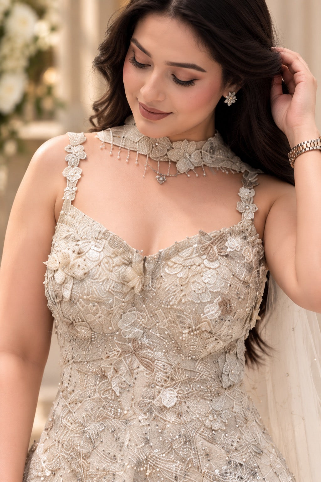 Close-up of white floral embroidered corset style kurta with delicate embellishment and neckline