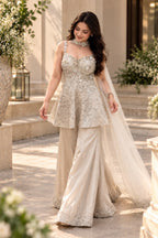 White embroidered kurta set with flared palazzo pants and sheer dupatta, elegant ethnic wear look